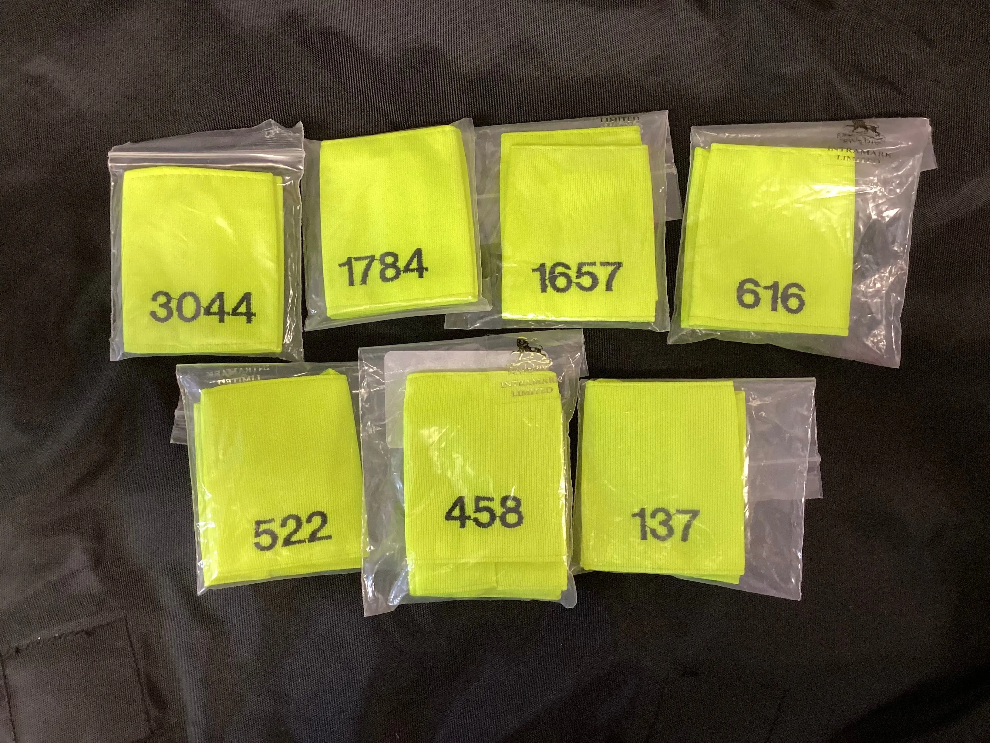 Epaulette Slides, Hi Vis yellow, black embroidered mixed numbers and lengths (Used – Grade A)